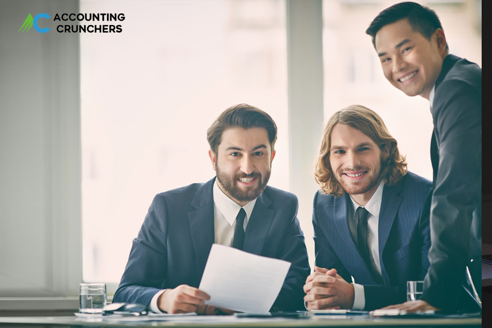 Payroll outsourcing professional managing employee payments digitally for a UK business to save time and money