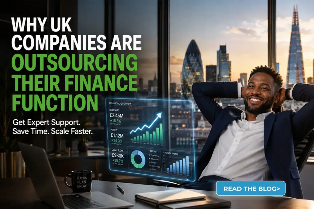UK business owner reviewing financial data dashboards in a modern London office, representing outsourced accounting services.